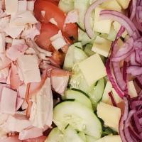 Chef Salad · Green Salad with Ovengold Turkey, Black Forest Ham, Swiss Cheese, Tomato, Red Onion and Cucu...