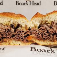 Beef 2 Bomber · Tender Roast Beef and Melted Swiss Cheese Piled High on a Warm French Roll and Served with a...