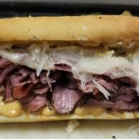 Reuben Twist · Thin Sliced Pastrami & Corned Beef, Melted Swiss Cheese, Sauerkraut and Chipotle Mayonnaise ...