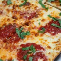 Grandma Pizza Pie · Sicilian. Square Pizza w/ Fresh Mozzarella, Basil & Crushed Tomatoes.