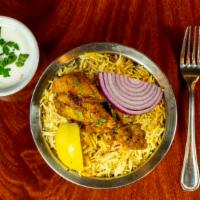 Chicken Biryani · Long-grained rice (basmati) flavored  cooked with fragrant saffron, Aroma spices, fresh mint...