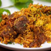Lamb Biryani · Long-grained rice (basmati) flavored  cooked with fragrant saffron, Aroma spices, fresh mint...