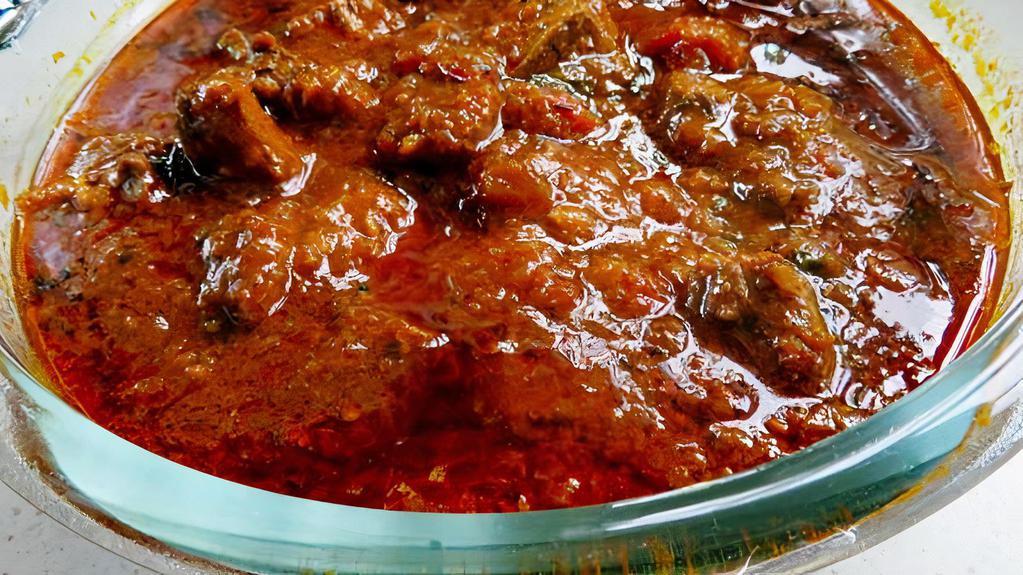 Lamb Curry · typical curry from the Indian subcontinent consists of boneless Lamb stewed in an onion- and tomato-based sauce, flavoured with ginger, garlic, tomato puree, chilli peppers and a variety of spices, often including turmeric, cumin, coriander, cinnamon, and cardamom