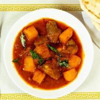 Lamb Vindaloo · Lamb and potatoes cooked in a very hot and tangy Goan sauce.