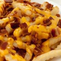 Bacon Cheese Fries · Fries topped with bacon, scallions, and cheese.