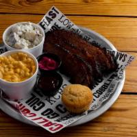 Brisket Plate · Our Beef Brisket is slow smoked for 14 hours comes with your choice of 2 sides and a Jalapen...