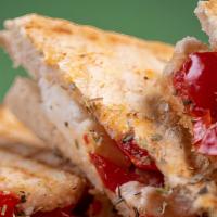 Chicken Shish Kabob Sandwich · Boneless chunks of tender, marinated chicken breast in between a medley of onions, green pep...