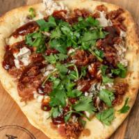 Yard Bird · Shredded chicken over melty jack cheese topped with sweet and smoky BBQ sauce, bacon and fre...