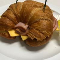 Ham & Cheese Croissant · Ham and American cheese grilled on a croissant.