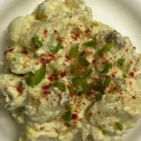 Potato Salad · Fresh potato salad with diced celery onion, red diced bell peper, sweet basil, mayo & mustard
