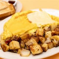 Four Cheese Omelette · Eggs, American cheese, Swiss cheese, shredded cheddar cheese, and Monterey jack cheese. Come...