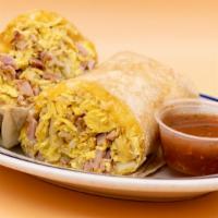 Ham Breakfast Burrito · Ham, eggs, hashbrowns, and shredded cheese wrapped in a flour tortilla.