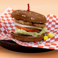 Veggie Burger · Wheat bun, veggie patty, lettuce, tomato, white onions, pickles, and our signature 1000 Isla...
