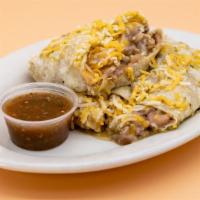 Green Chile Burrito · Pork, fresh chile verde, Mexican rice, refried beans, and melted shredded cheese wrapped in ...