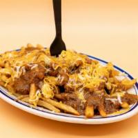 Large Chili Cheese Fries · A large order of French fries, covered in our freshly-made chili and melted shredded cheese.