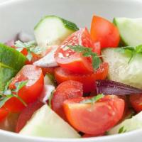 Tomato Salad · brioche croutons, red onion, ricotta, herb dressing.