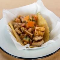 Classic Chicken Taco · Authentic taco with chicken on fresh-made corn or flour tortillas, served with fresh pico de...