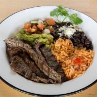 Steak Dinner Plate · Steak, served with rice, pinto or black beans, fresh pico de gallo, fresh guacamole with fre...