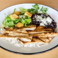 Studio Plate · Charbroiled chicken on white rice, black beans, salad and roasted red bell pepper crema. Ser...