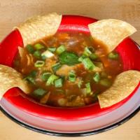 Neighborhood Famous ® Tortilla Soup · Our neighborhood famous ® tortilla soup is a savory broth brimming with fresh vegetables, to...