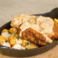 The Cure · house biscuit, sausage gravy, tots, scrambled eggs, with choice of spicy chicken sausage, fr...