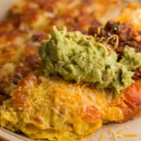 California Omelette · Bacon, onions, peppers, jalapeños, mushrooms, tomatoes, garlic, cheese, guacamole, sour crea...