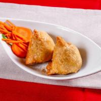 Vegetables Samosa (2 Pieces) · Deep fried pastry stuffed with spiced potatoes and green peas. Serve with tamarind chutney.