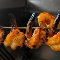 Shrimp Tandoori · Shrimp marinated in yogurt, Himalayan herbs and spices grilled in the tandoor oven and serve...