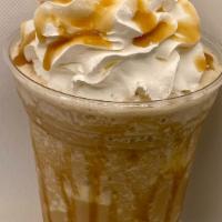 Caramel Frappe · 20 0Z  Cream Caramel Frappe Loaded with premium Caramel  and whip
