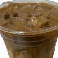 Iced Caramel Macchiato · 16 0z Espresso over ice poured over milk topped with caramel sauce