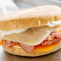 Breakfast Bagles · Toasted Bagel with Butter or Cream Cheese
Choice of Ham or Turkey
Choice of Cheese Colby, Mo...
