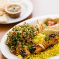 Chicken Skewer Plate · Marinated boneless chicken breast, grilled to perfection and served on a bed of rice with yo...