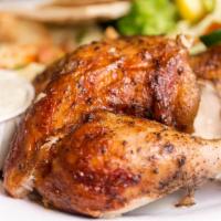 Family Value Chicken Meal · 2 whole chickens, 4 large sides & 10 pitas, 6 garlic sauces. Feeds 4-8 people