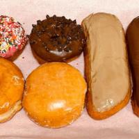 1/2 Mixed Dozen Donuts · Assortment of 6 donuts.
Normally Includes: 
2 long raised donuts ( chocolate or maple bars &...