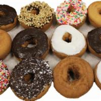 Dozen Cake · Assortment of 12 cake donuts.
Normally Includes: 

12 cake donuts (white or chocolate cakes ...