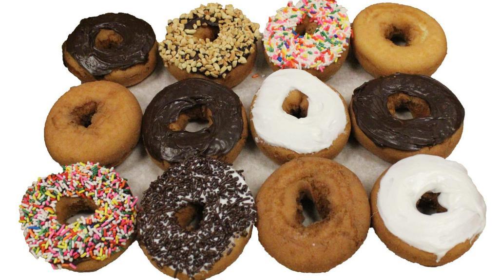 Dozen Cake · Assortment of 12 cake donuts.
Normally Includes: 

12 cake donuts (white or chocolate cakes with sprinkles or without sprinkles, blueberry, crumb, cinnamon sugar, or plain cake).

For specific donut selection, please use the 