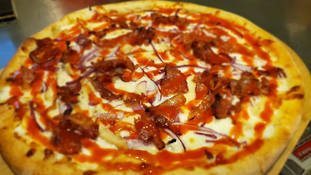 Buffalo Chicken Pizza (Large) · Chicken, bacon, red onions, base ranch sauce and mozzarella cheese.