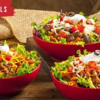 Bowl · Choice of ground beef, chicken or carnitas, romaine lettuce, whole pinto beans, Spanish rice...