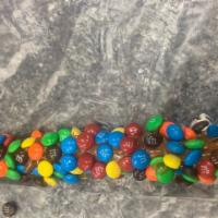 M&M Pretzel Rod · Pretzel rod rolled in caramel and M&M's