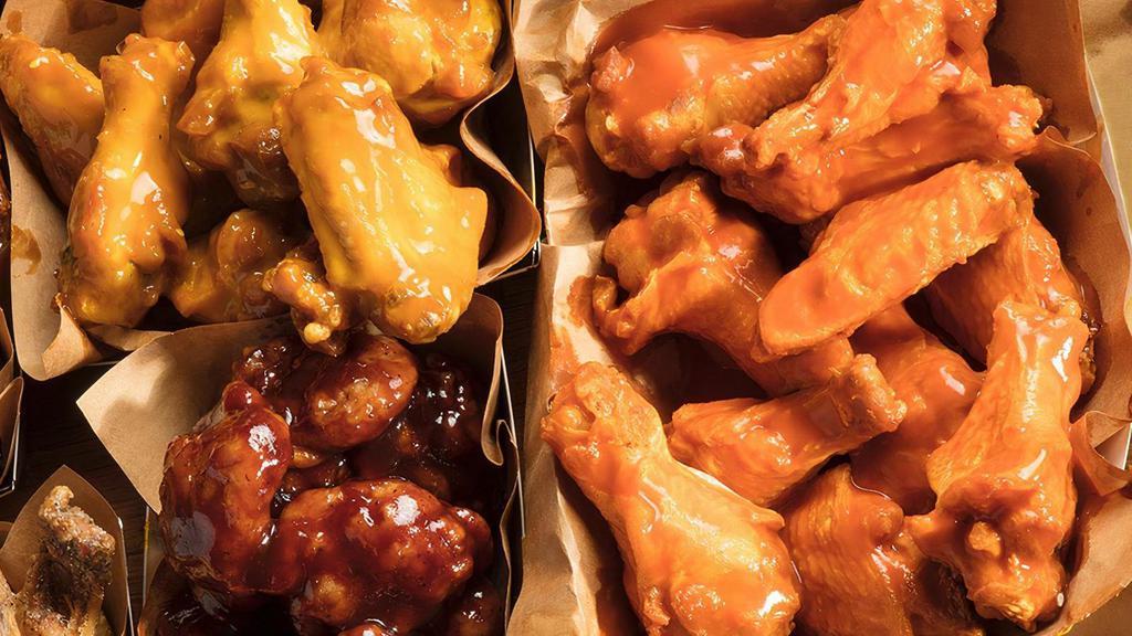 30 Pc Classic Wings · Hand-tossed in Your Choice of Sauce or Rub