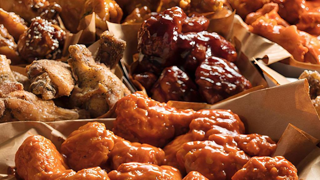 50 Pc Boneless Wings · Fifty Boneless Chicken Wings hand-tossed in your choice of 4 sauces or rubs..