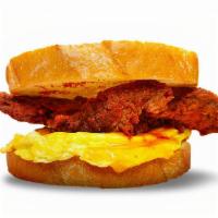 The Early Bird · Fried chicken with egg and cheddar cheese in between 2 toasted bread served with our signatu...