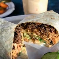 Carne Asada Burrito · Our delicious black beans, rice, pico de gallo, red house salsa and our Carne Asada (seitan)...