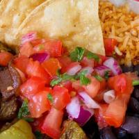 Veggie Bowl · Our black beans, rice, pico de gallo, and seasonal veggies  in a bowl. All the goodness of t...