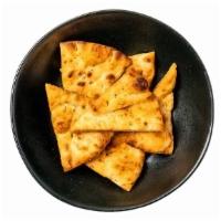 Pita Chips · Made in-house in small batches, our pita chips are meant for big dipping. Contains sesame.