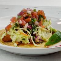 Grilled Chicken Taco · Achiote grilled chicken, verde slaw, and pico de gallo.