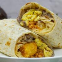 Breakfast Burrito · Scrambled eggs, cheesy bean dip, cheese, salsa, tater tots, and tortilla strips.