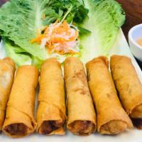 Egg Rolls · Savory mixture of ground chicken, jicama, carrot, taro, onion, and noodles. Wrapped and frie...