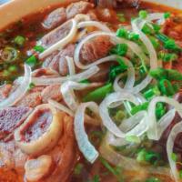 Hue Style Spicy Beef Vermicelli Noodle Soup (Regular) · Beef-based broth cooked delicately with tender beef shank, essence of lemongrass, dried chil...