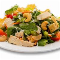 Chinese Chicken Salad · Chicken breast, romaine, carrots, green onions, celery, and wontons